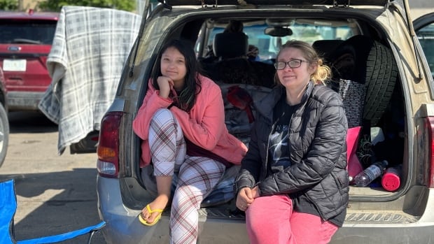 mom and daughter in car